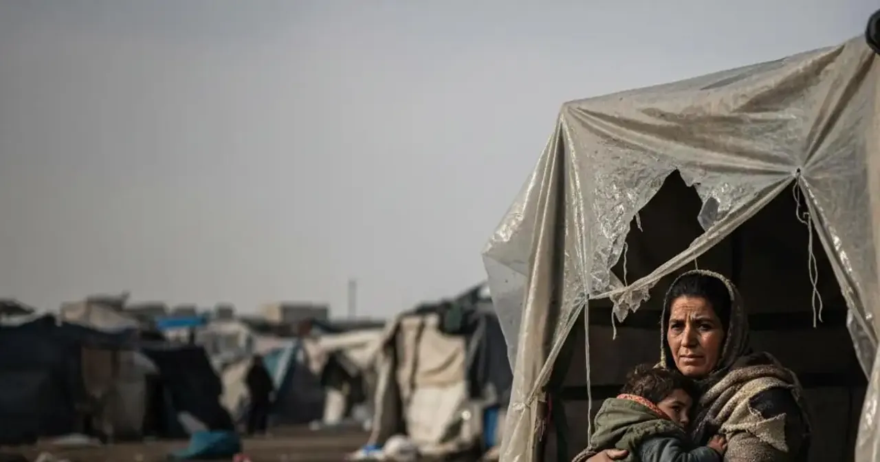 Displaced family surviving winter inside a Gaza tent