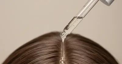 تطبيق سيروم فروة الرأس باستخدام قطارة