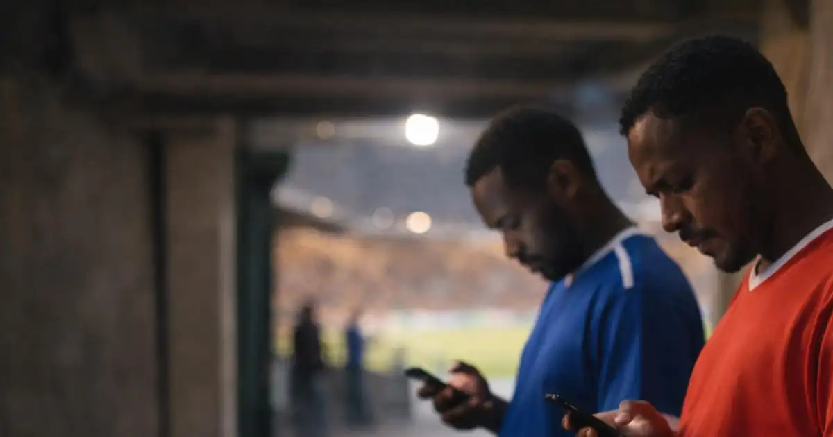 Sudanese football fans reacting to transfer rumors in a stadium